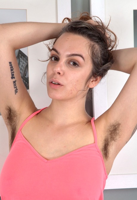 Curvy Beauvoir loves to show off her hairy pits and snatch - 1 of 16