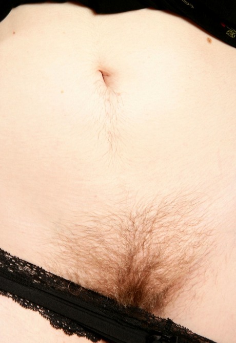 Blonde lady Teddy pulls her panties down to unveil her bush - 5 of 16