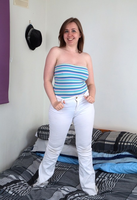 Busty Alice spreads her legs to show off her wild hairy bush