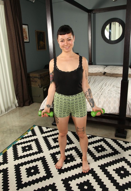 Furry tattooed Tatum gets naked and naughty in the floor