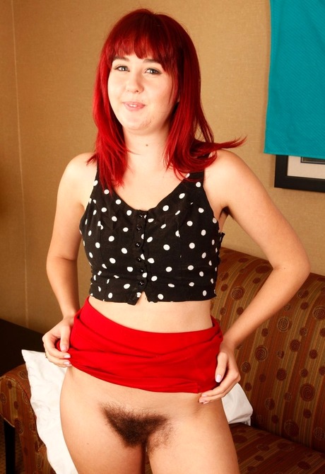 Hairy pussy redhead Aali showing her unshaved snatch - 4 of 16