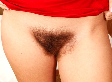 Hairy pussy redhead Aali showing her unshaved snatch - 5 of 16