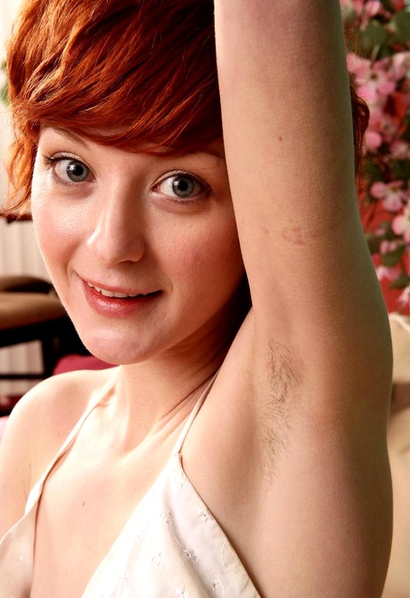 Flirty redhead Agnes shows her furry pits and fuzzy snatch - 6 of 15