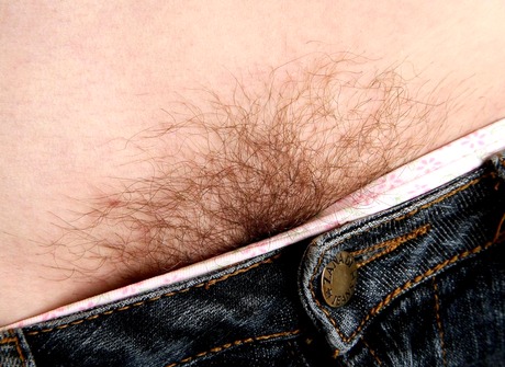 Pretty redhead Agnes gives a peek at her woolly little twat - 3 of 15