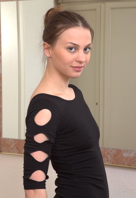 Tempting Alice gets naked and teases her sexy unshaven pussy