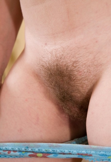 Busty young natural Alice showing unshaved hairy pussy - 6 of 16