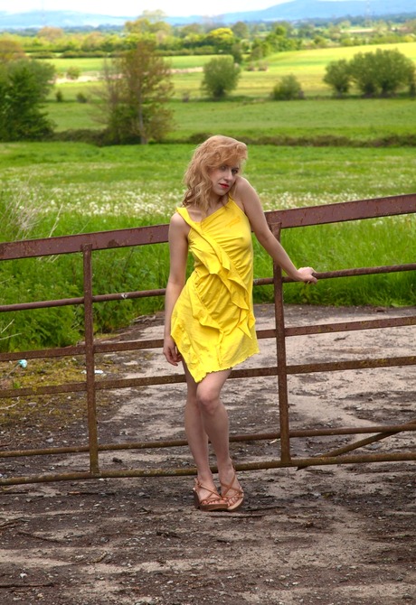 Dirty blonde Alice gets naked outdoors and shows her snatch