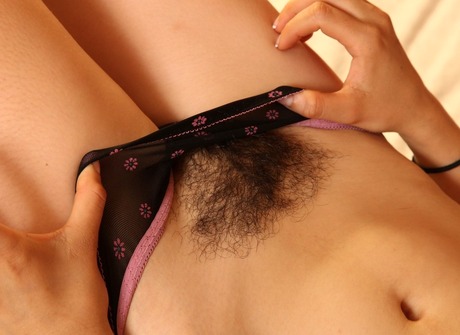 Hairy natural babe Altaira toying unshaved pussy in bedroom - 6 of 16