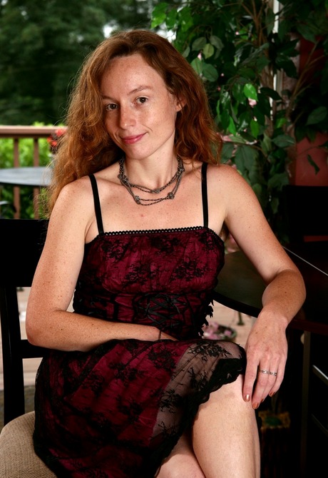 Flirty Ana Molly has fun teasing her naturally full bush
