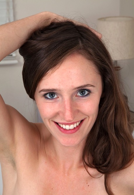 Slender natural Anya showing closeup hairy pussy shots - 2 of 16