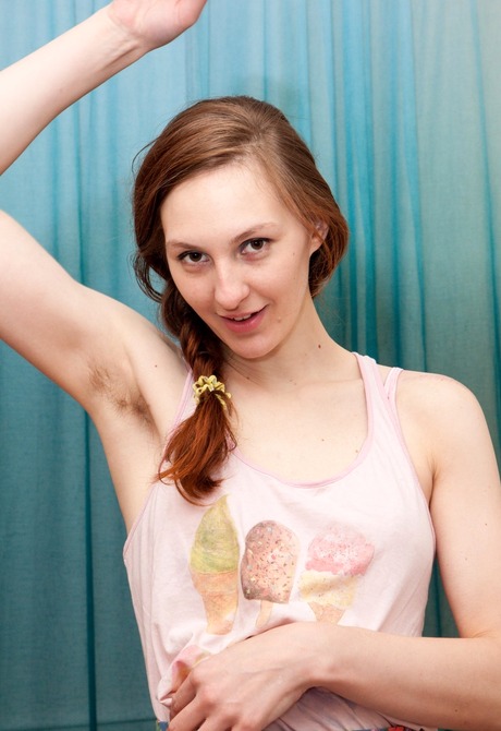 Flirty Ariadna shares her fuzzy pits and thick hairy beaver