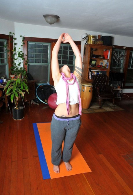 Fit natural amateur Artemisia doing yoga and spreading muff