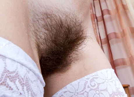 Amateur in panties showing hairy pussy in upskirt shots - 13 of 16