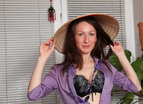 Barcelona teases and fingers her furry monkey in a chair