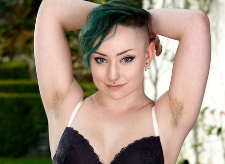 Edgy hottie Blath strips and teases with her hairy pussylips