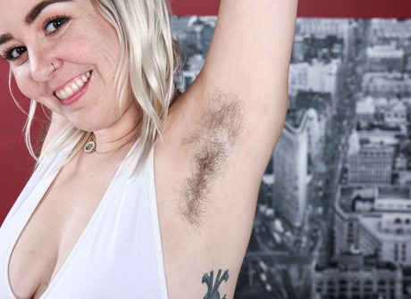 Curvy blonde Bratty shares her unshaved pits and bushy pussy - 3 of 16