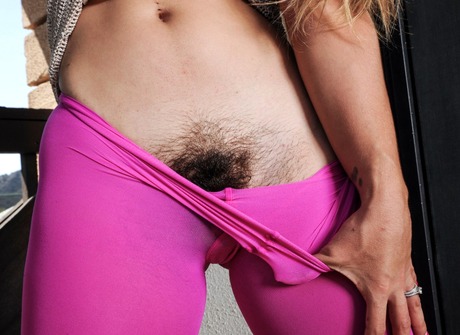 Furry Bunny peels off her tights to flaunt her hairy crotch - 3 of 16