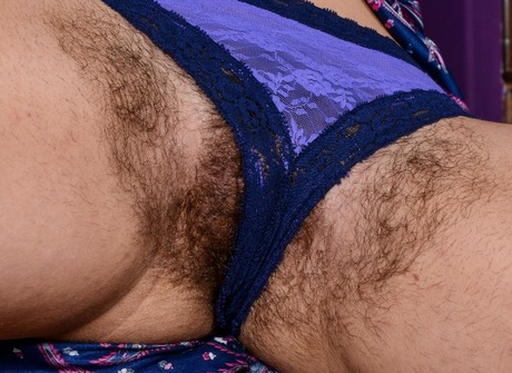 Hirsute natural Bunny showing her thick furry snatch - 2 of 16