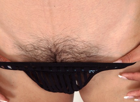 Sensual brunette Cala strips and flaunts her shaggy coochie - 5 of 16