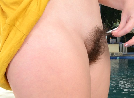 Flawless Cali lifts her dress to expose her unshaved pussy - 8 of 16