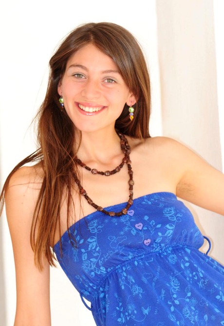 Beautiful Carmela lifts her dress and teases her sexy snatch