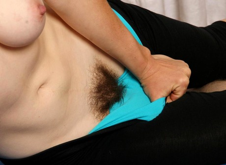 Busty Charley does naked yoga and shows her unshaved pussy - 6 of 15