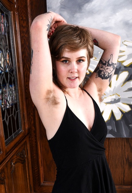 Tattooed young Claire shares her hairy pits and untamed bush - 2 of 16