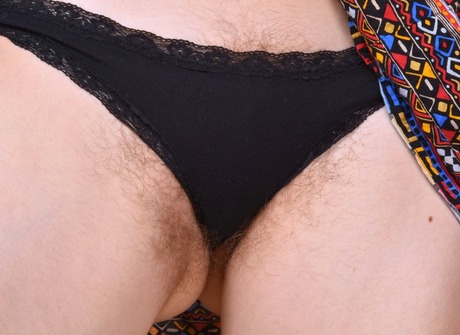 Flirty Clara gets naked and spreads her shaggy pussy open - 5 of 16