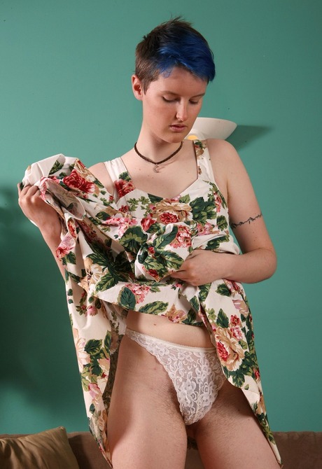 Slender short haired Cyan shows her bushy crotch and spreads - 2 of 16