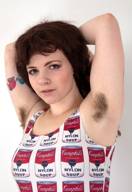 Tattooed brunette Cynthia teases her furry pits and hot bush - 2 of 16