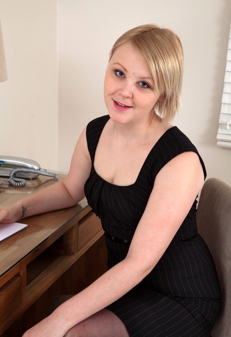 Thick natural blonde Danniella showing her hairy pussy