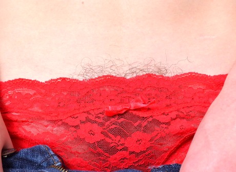 Sweet young Ember strips to let you see her unshaved pussy - 4 of 16