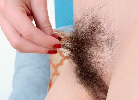 Sensual brunette Ember flaunts her unshaved pits and snatch - 10 of 16