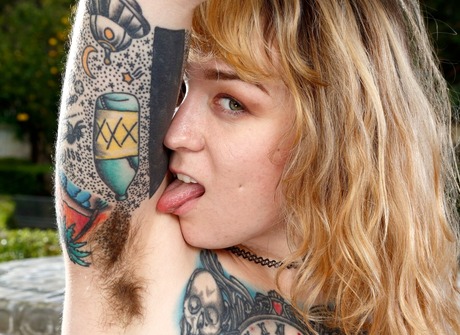 Fully furry Felicia shows off her tiny tits and giant snatch - 3 of 16