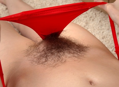 Skinny curly haired Honey shows off her very hairy snatch - 8 of 16