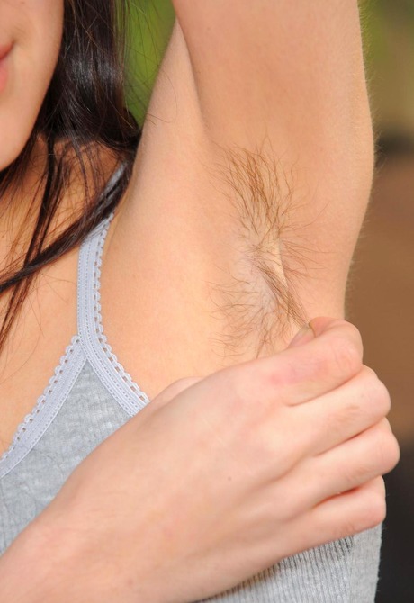 Skinny Jade shows her furry pits and teases her hairy crotch - 3 of 15