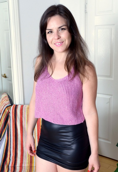 Dark haired Juliette shows her woolly coochie in just heels