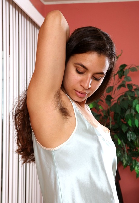 Exotic brunette Kalei exhibits her hairy pits and furry bush
