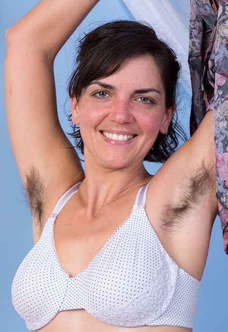 Flirty girl Katie exposes her shaggy coochie and furry pits - 6 of 16