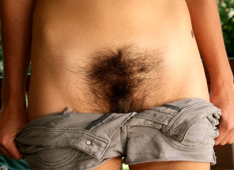 Natural Katie unleashes her huge bushy beaver on the patio - 11 of 16