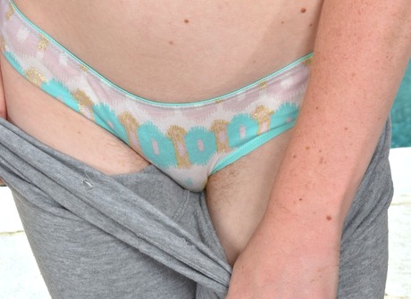 Cute young redhead Kierra teases and fingers her fire crotch