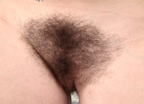 Furry Kitty teases and flaunts her thick hairy crotch - 7 of 16