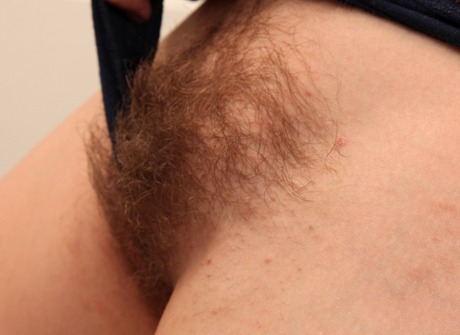 Sensual Lissa pleasures her hairy coochie with a vibrator - 6 of 16