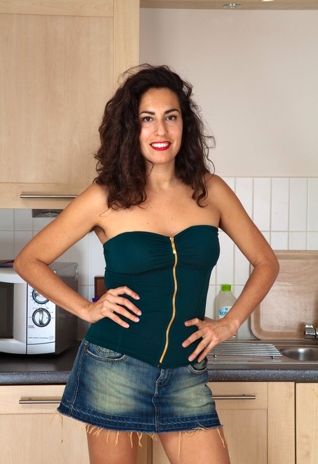 Hairy exotic amateur Liz spreading furry pussy in kitchen - 2 of 16