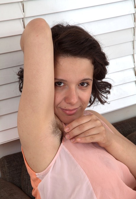 Playful brunette Lula exhibits her woolly coochie in a chair - 2 of 16