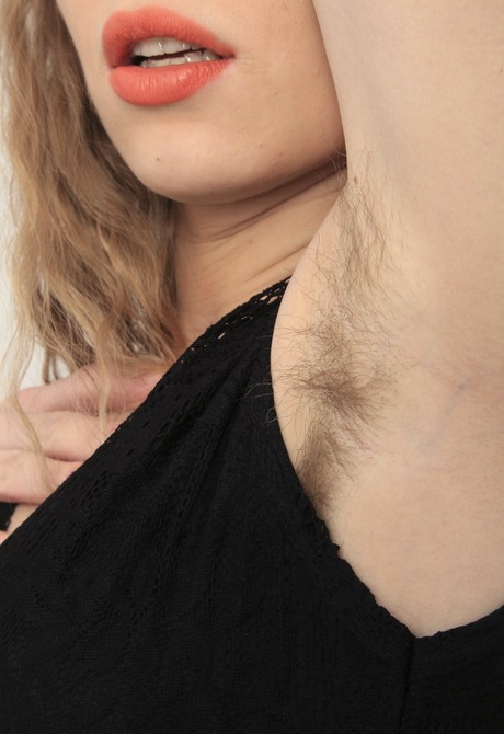 Natural Margaret strips naked and fondles her shaggy cunt