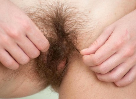 Lovely little Marusia strips to show her super hairy crotch - 12 of 15