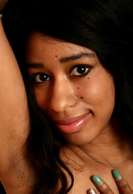 Slender ebony Mia displays her hot kinky bush in high heels - 6 of 16