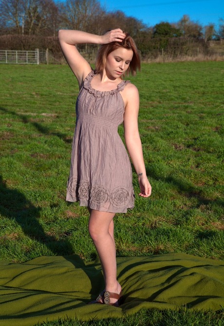Hairy honey Minnie gets naked and poses naughty outdoors