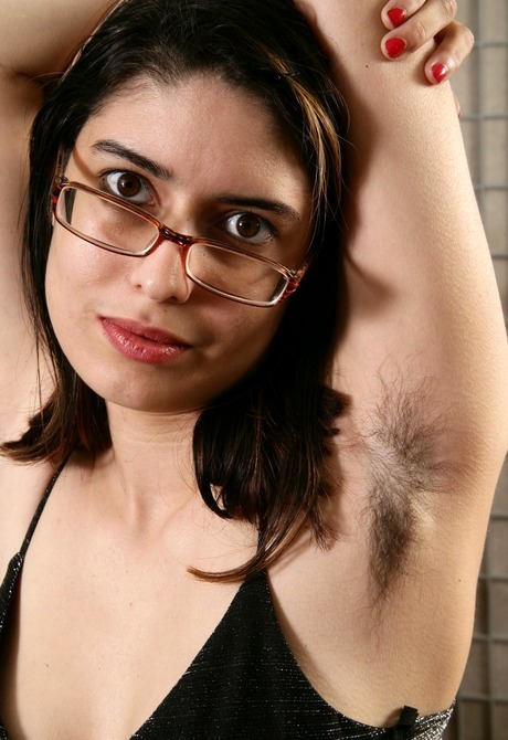 Exotic brunette Mitena lets you see her big furry monkey - 2 of 16